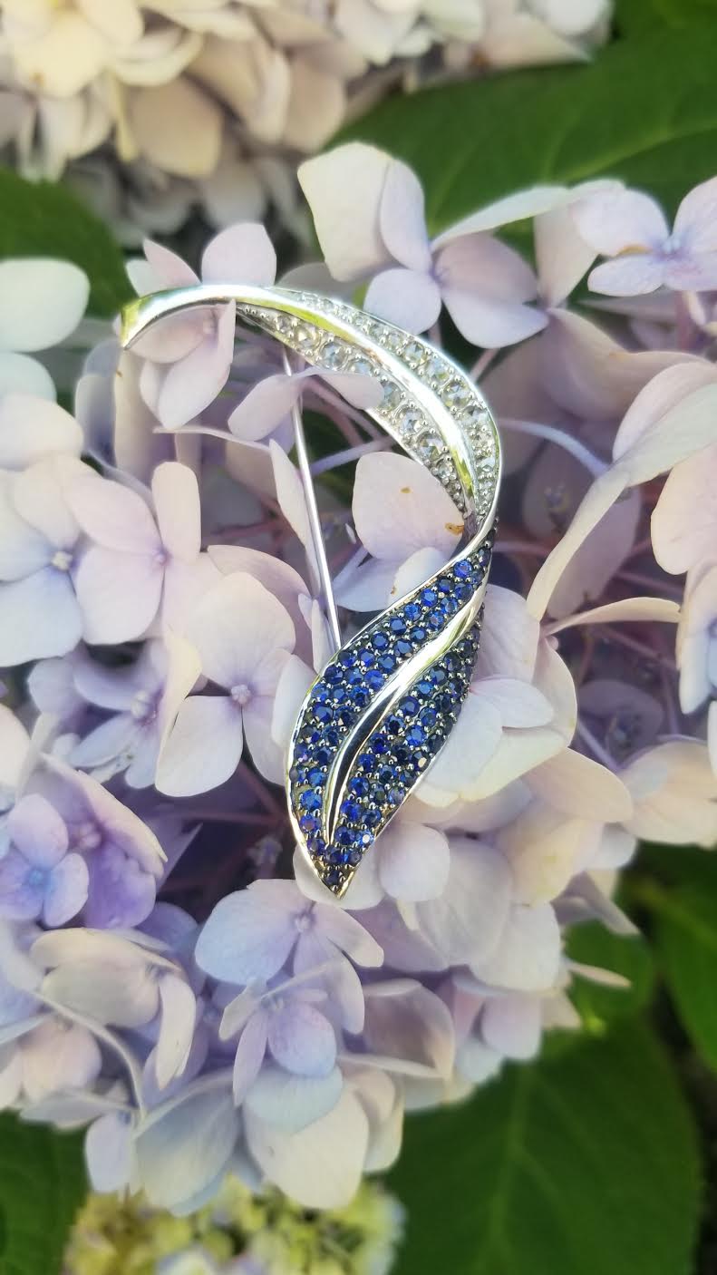 Brooch on hydrangea flowers