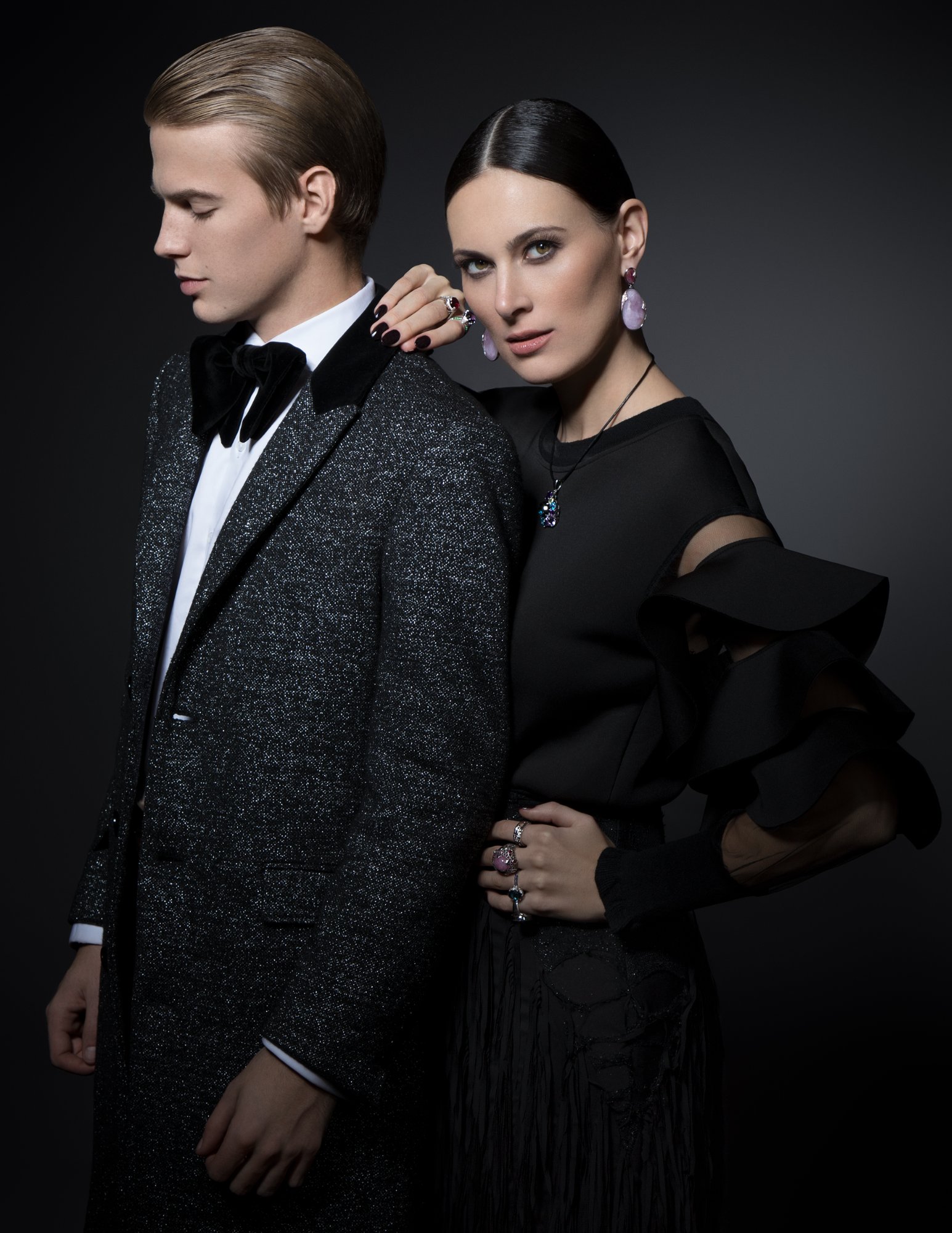 Rose quartz pendant earrings and gemstone cocktail rings with black evening wear