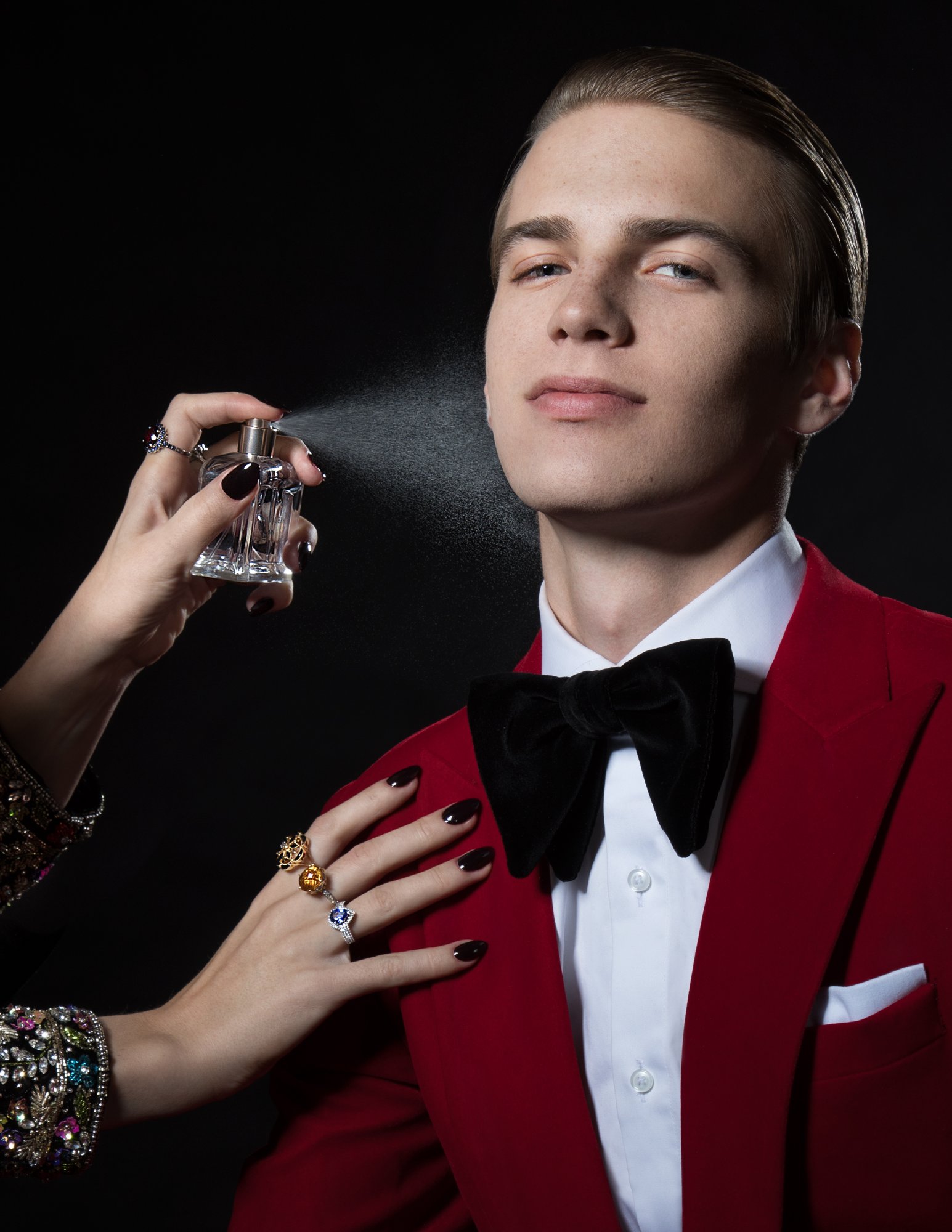 Citrine and sapphire cocktail rings with ornate gold bracelet
